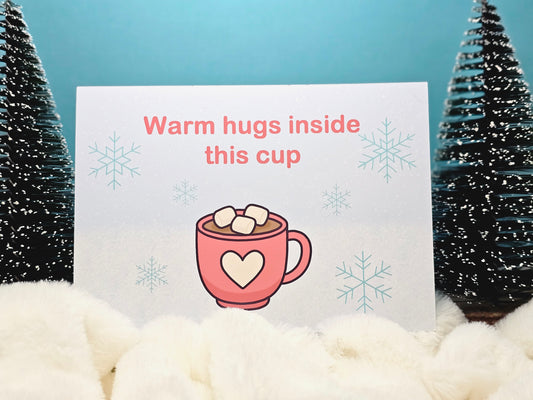 Weihnachtspostkarte – „Warm Hugs Inside This Cup“